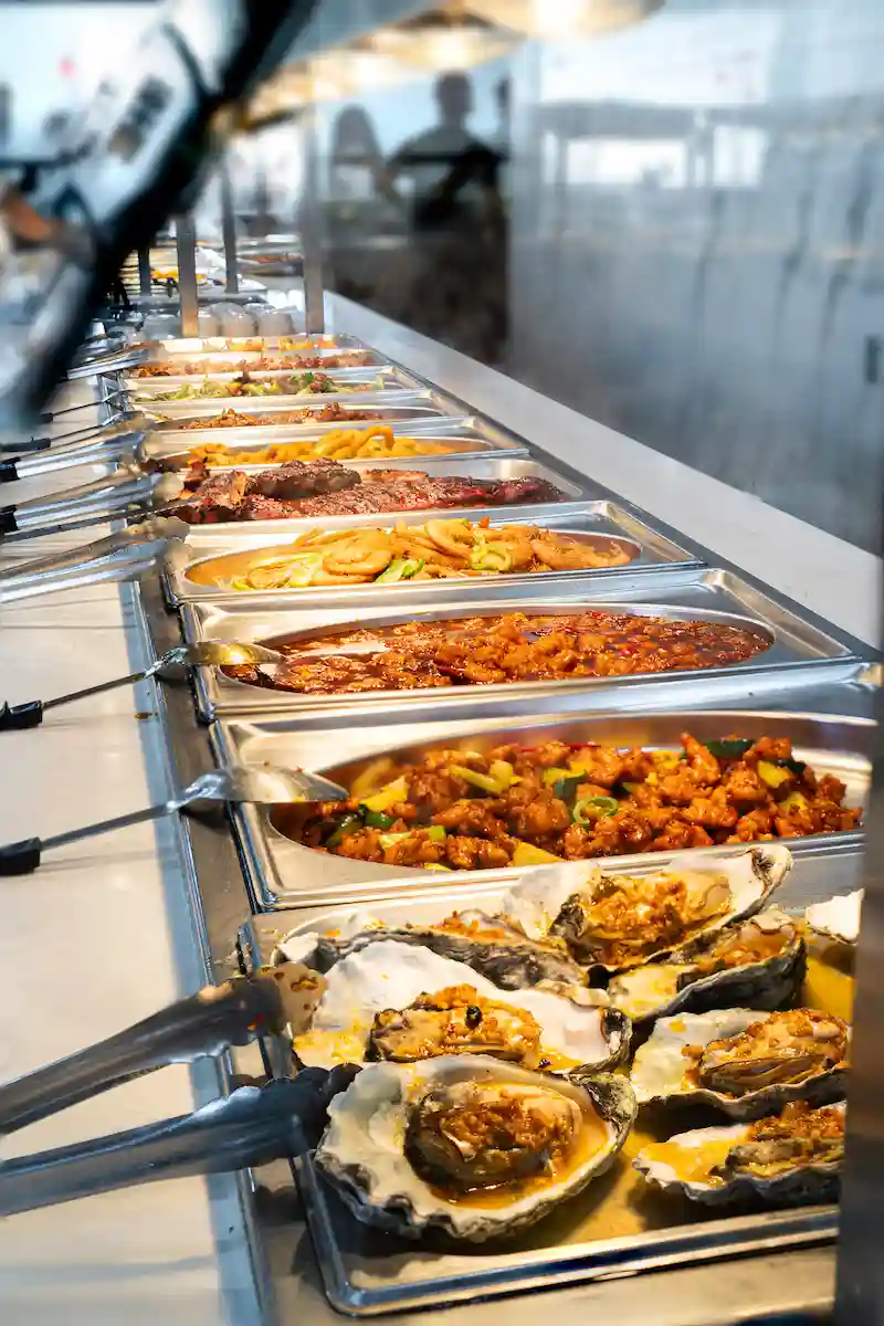 Buffet Line with Baked Oysters and Hot Dishes